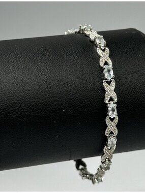 Infinity Link Tennis Bracelet Sterling Silver Blue Oval Stones 8 Grams 7.25”